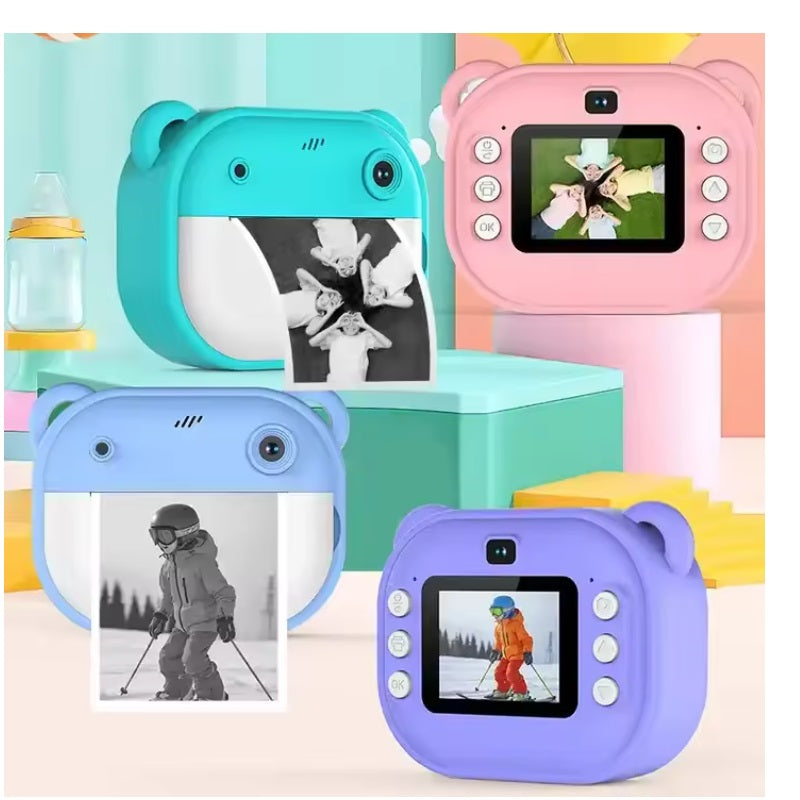 Aparat foto copii cu imprimare termica, ecran IPS 2.4”, rezolutie 10MP, video 1080P, jocuri incluse, card TF pana la 64GB, baterie 1200mAh